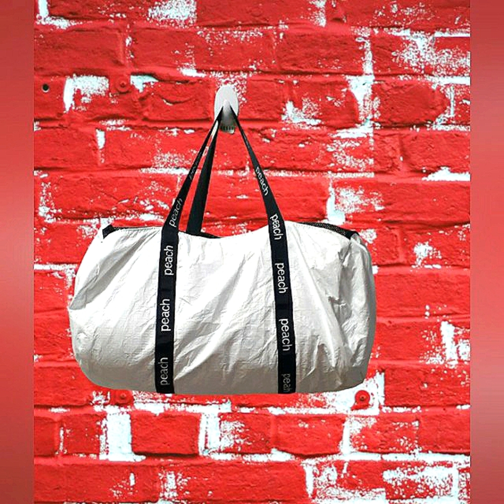 - - ***RECYCLED*** PEACH BRAND WHITE RECYCLED DUFFLE BAG